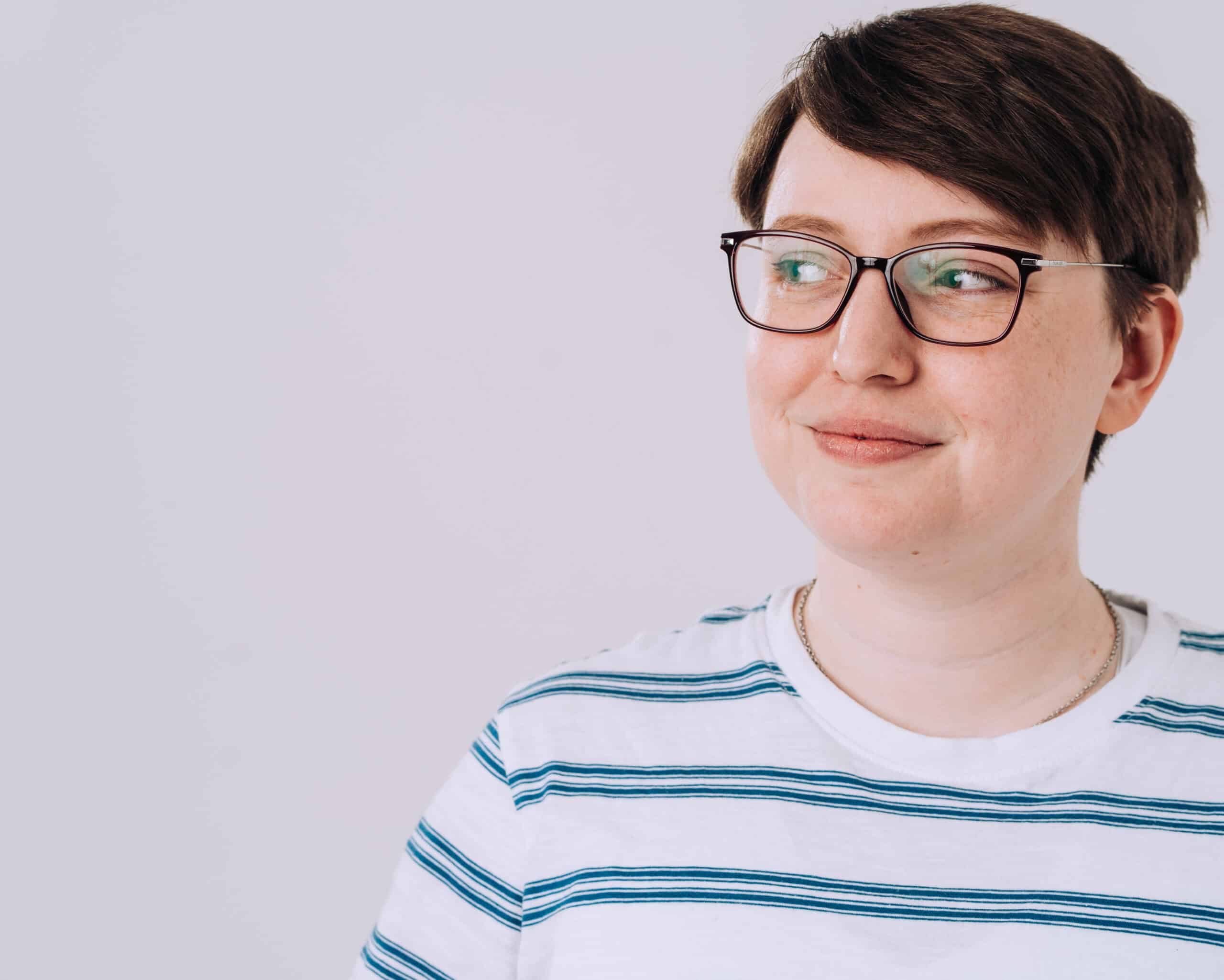 A person looking to their side uncertain.