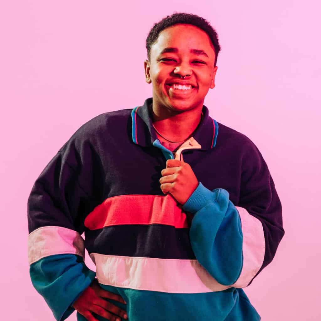 A person smiling at the camera.